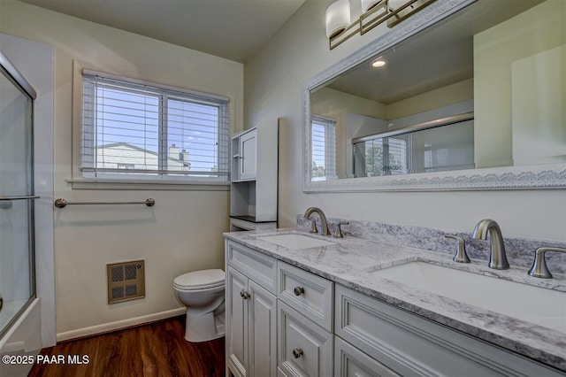 1242 Stetson Rd Unit 21, Prescott, AZ 86303 - full bathroom with plenty of natural light, wood finished floors, double vanity, and heating unit