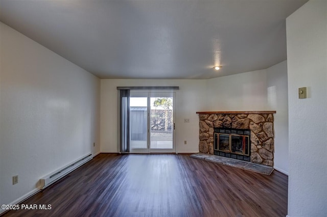 1242 Stetson Rd Unit 21, Prescott, AZ 86303 - unfurnished living room featuring a baseboard radiator, dark wood-style flooring, and a fireplace