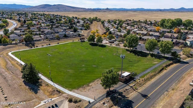 drone / aerial view with a residential view and a mountain view