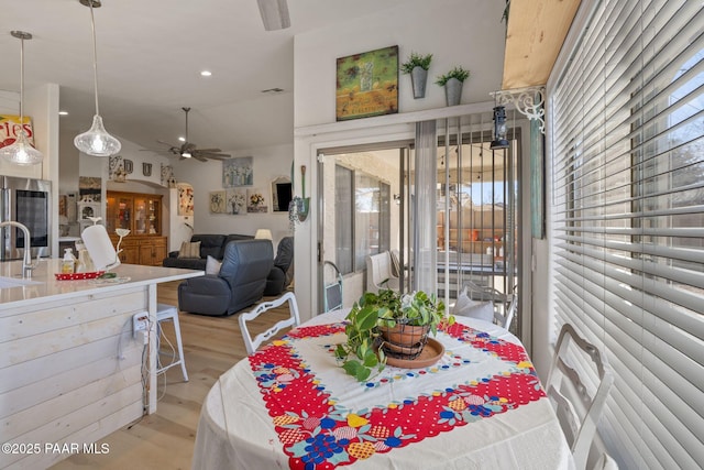 dining area featuring light wood finished floors, visible vents, recessed lighting, and ceiling fan