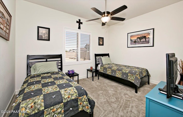 bedroom featuring carpet and ceiling fan