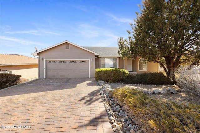 ranch-style home with a garage