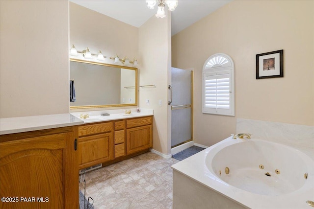 bathroom featuring vanity, vaulted ceiling, and shower with separate bathtub