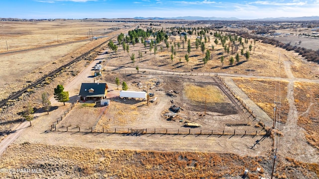 birds eye view of property featuring a rural view