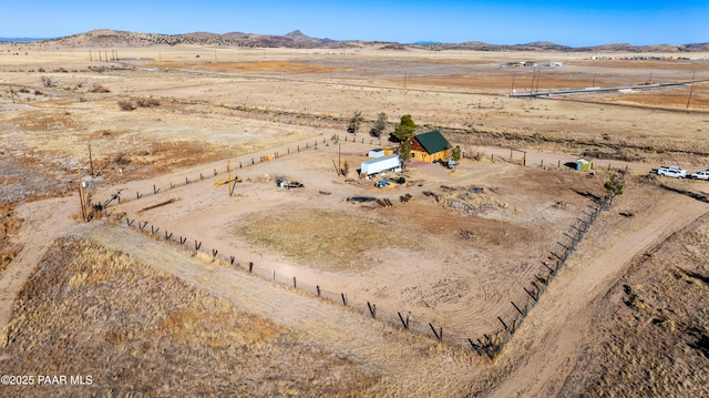 aerial view with a mountain view and a rural view