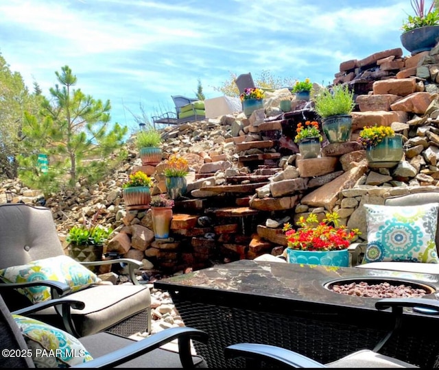 balcony with an outdoor fire pit