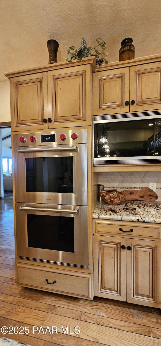 1515 N Happy Valley Rd Unit 3 & 4, Prescott, AZ 86305 - kitchen featuring stainless steel appliances, light wood-style floors, and light stone countertops