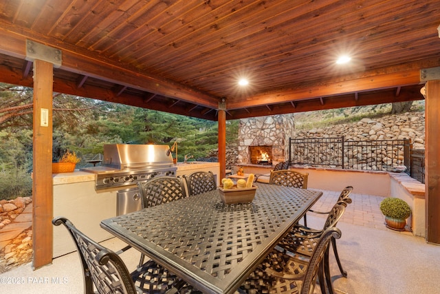 1515 N Happy Valley Rd Unit 3 & 4, Prescott, AZ 86305 - view of patio / terrace with an outdoor stone fireplace, area for grilling, and outdoor dining area