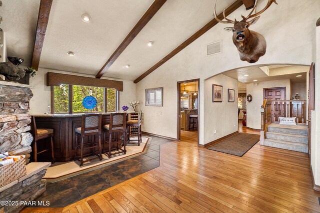1515 N Happy Valley Rd Unit 3 & 4, Prescott, AZ 86305 - indoor dry bar with arched walkways, beam ceiling, hardwood / wood-style floors, stairway, and high vaulted ceiling
