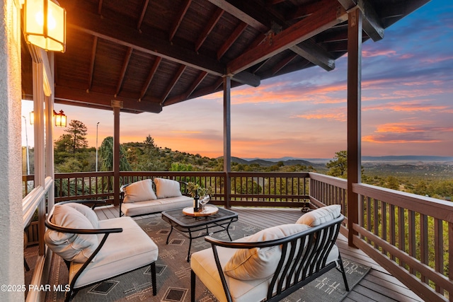 1515 N Happy Valley Rd Unit 3 & 4, Prescott, AZ 86305 - deck at dusk with an outdoor living space and a mountain view