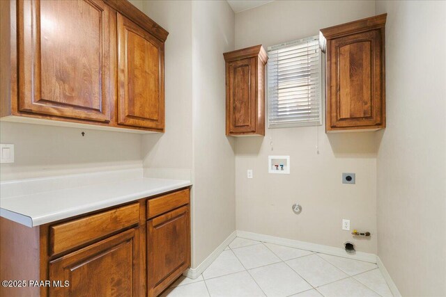 13375 N Iron Hawk Dr, Prescott, AZ 86305 - laundry area with cabinet space, baseboards, hookup for a gas dryer, hookup for a washing machine, and hookup for an electric dryer