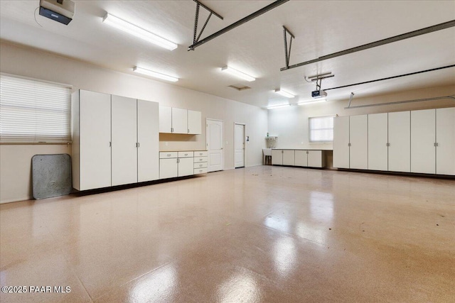 13375 N Iron Hawk Dr, Prescott, AZ 86305 - garage featuring a garage door opener