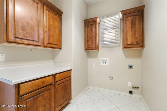 13375 N Iron Hawk Dr, Prescott, AZ 86305 - washroom featuring washer hookup, cabinet space, hookup for an electric dryer, gas dryer hookup, and baseboards
