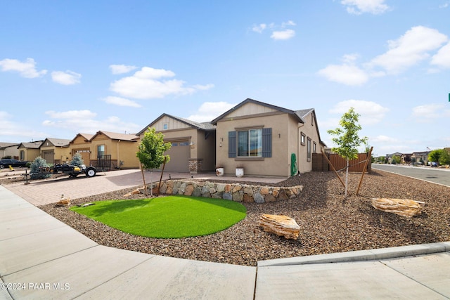 single story home with a garage