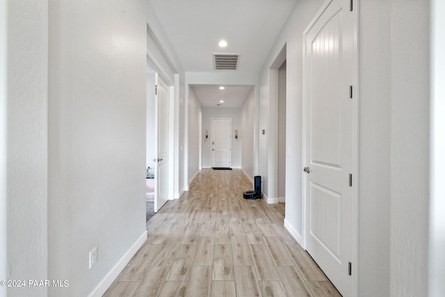 hallway featuring light hardwood / wood-style floors