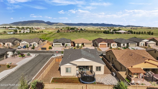 drone / aerial view featuring a mountain view