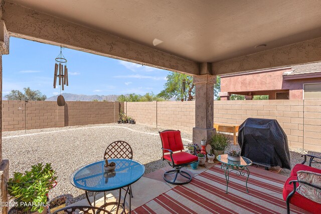 1819 W Deer Creek Rd, Phoenix, AZ 85045 - fenced backyard featuring a grill and a patio area