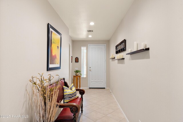 1819 W Deer Creek Rd, Phoenix, AZ 85045 - entryway featuring light tile patterned floors, recessed lighting, and baseboards