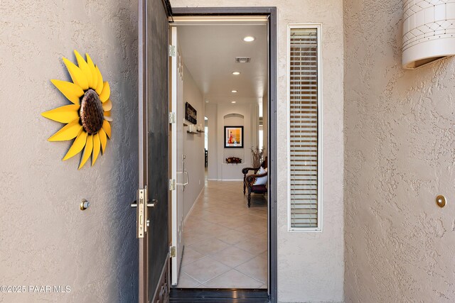 1819 W Deer Creek Rd, Phoenix, AZ 85045 - view of exterior entry with stucco siding
