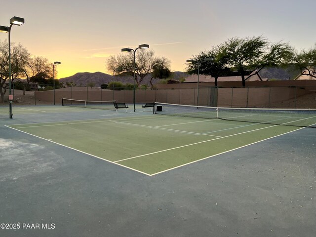 1819 W Deer Creek Rd, Phoenix, AZ 85045 - view of tennis court with a mountain view