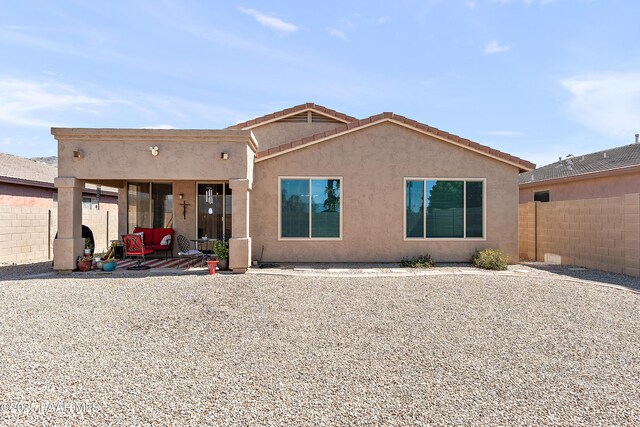 1819 W Deer Creek Rd, Phoenix, AZ 85045 - view of front of property featuring stucco siding and a patio area