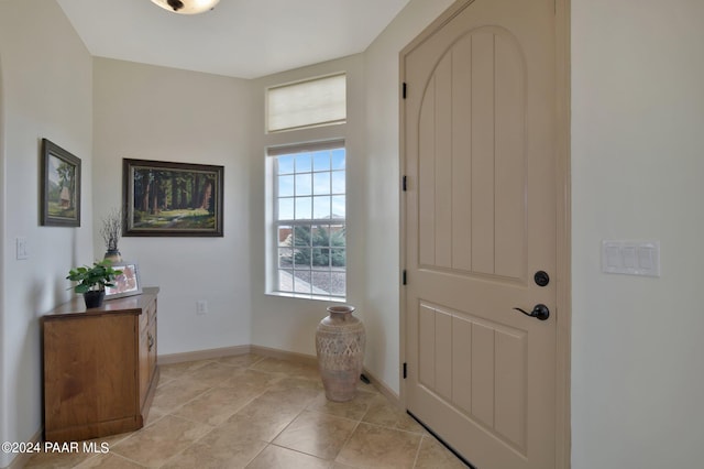 view of tiled foyer entrance