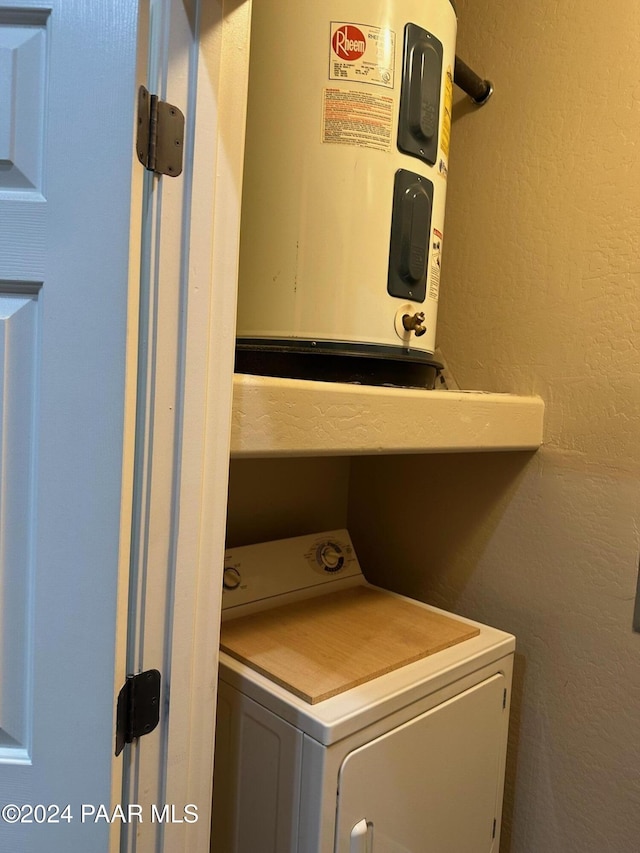 washroom featuring washer / clothes dryer