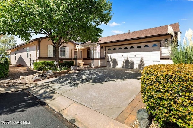 ranch-style house with a garage