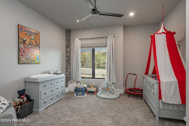 game room with light colored carpet and ceiling fan