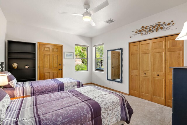 4710 Echo Canyon Pl, Prescott, AZ 86301 - bedroom featuring carpet flooring, visible vents, baseboards, a closet, and a ceiling fan