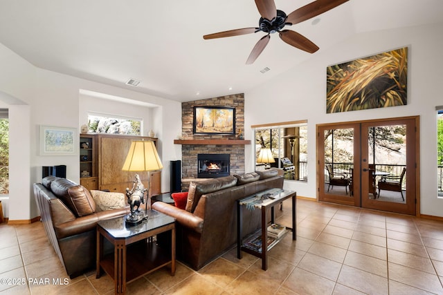 4710 Echo Canyon Pl, Prescott, AZ 86301 - living room featuring visible vents, a wealth of natural light, a fireplace, and vaulted ceiling