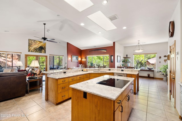 4710 Echo Canyon Pl, Prescott, AZ 86301 - kitchen with a large island, light tile patterned floors, black electric cooktop, visible vents, and open floor plan