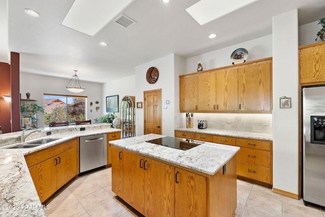4710 Echo Canyon Pl, Prescott, AZ 86301 - kitchen featuring light tile patterned floors, visible vents, a kitchen island, and stainless steel appliances