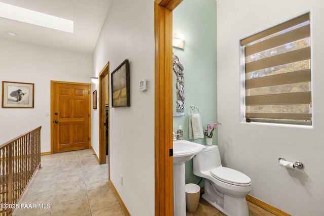 4710 Echo Canyon Pl, Prescott, AZ 86301 - bathroom featuring tile patterned floors, baseboards, a skylight, and toilet