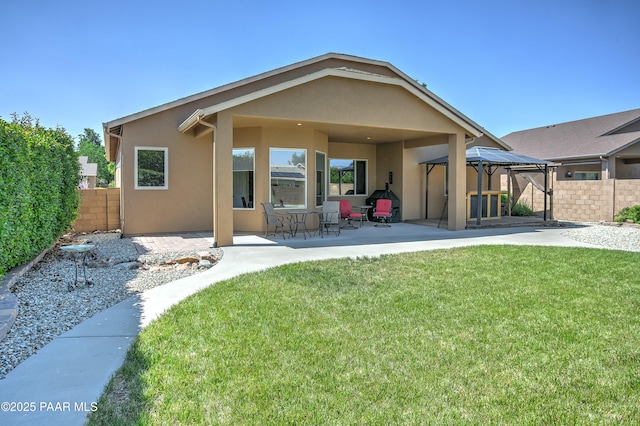 6582 E Farmstead Rd, Prescott Valley, AZ 86314 - back of house with stucco siding, a gazebo, and a patio area