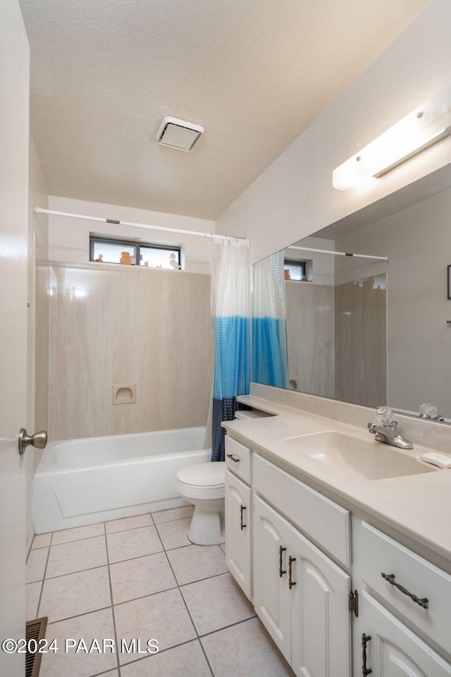 full bathroom with tile patterned flooring, vanity, shower / bath combination with curtain, and toilet