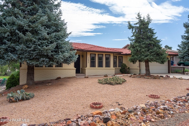 view of front of home with a garage