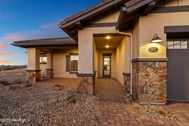 view of front of property with a garage