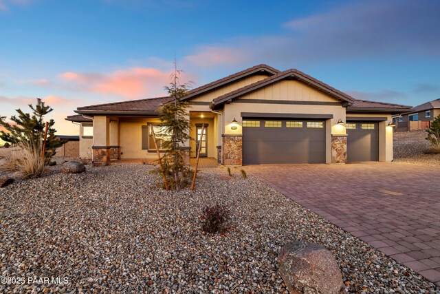 view of front of property featuring a garage