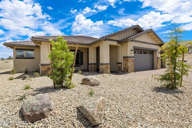 view of front of home with a garage