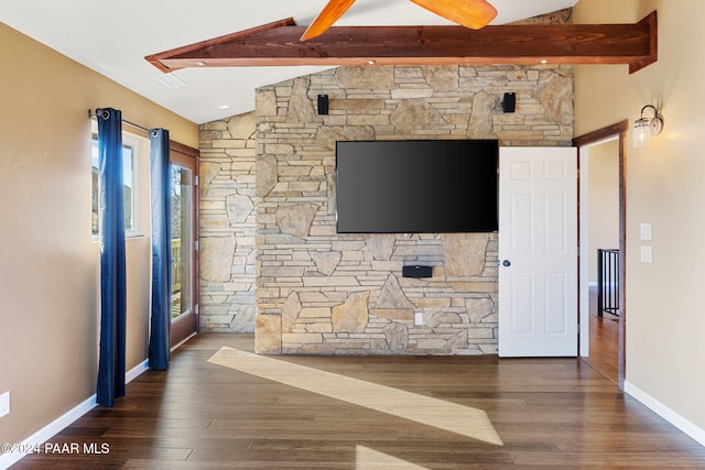 unfurnished living room featuring lofted ceiling with beams and dark hardwood / wood-style floors