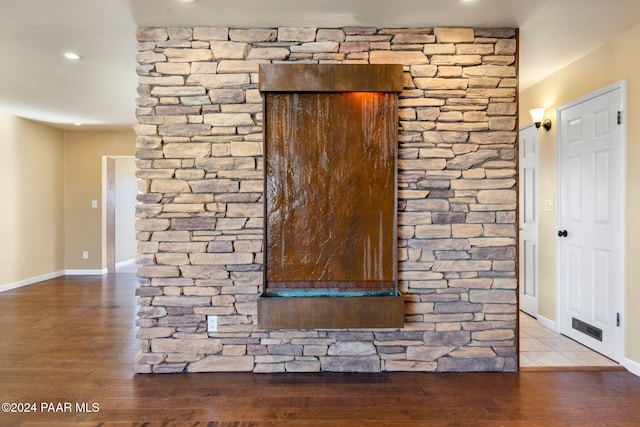 interior details featuring wood-type flooring