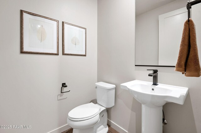 5711 E Hahn St, Prescott Valley, AZ 86314 - bathroom with baseboards and toilet