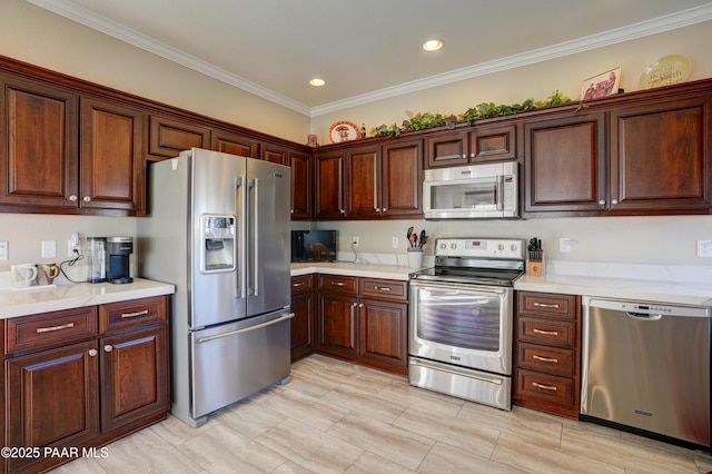kitchen featuring stainless steel appliances and crown molding