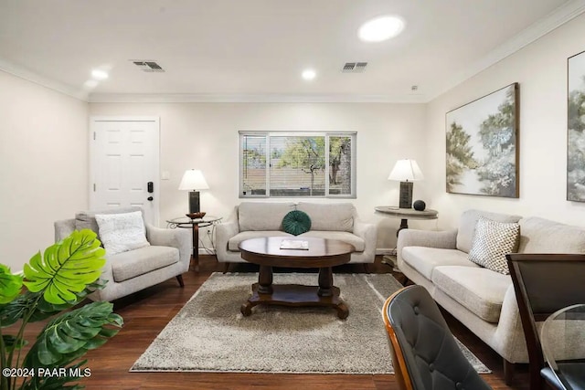 living room with ornamental molding and dark wood-type flooring