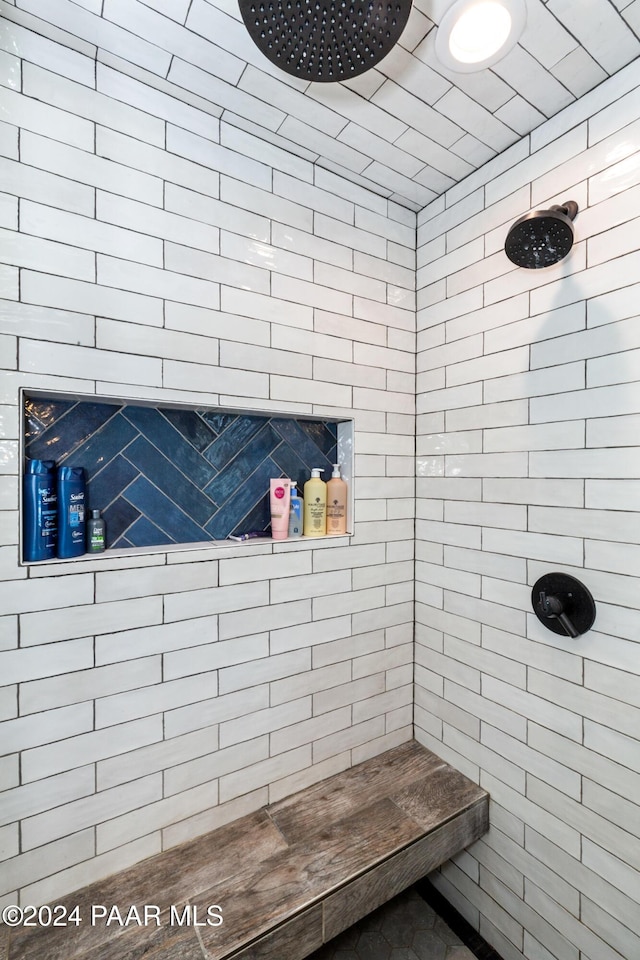 interior space featuring a tile shower