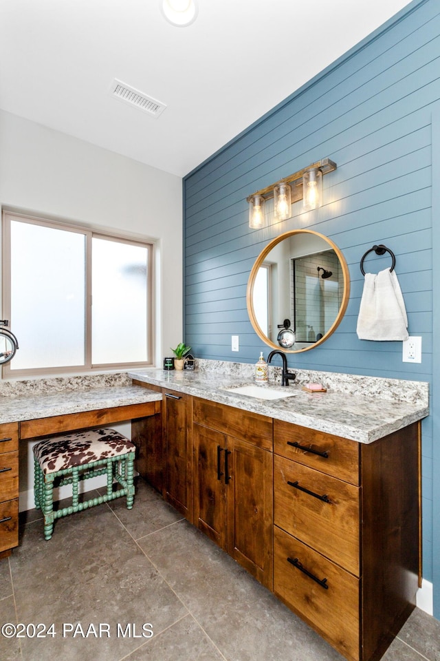 full bathroom featuring visible vents and vanity