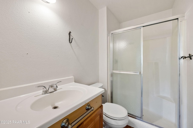 401 Valley Pl, Prescott, AZ 86301 - full bathroom with a stall shower, a textured wall, toilet, and vanity
