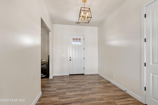 9550 N Manger Rd, Prescott Valley, AZ 86314 - foyer entrance with a chandelier and wood finished floors