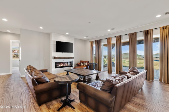 9550 N Manger Rd, Prescott Valley, AZ 86314 - living room with recessed lighting, light wood finished floors, and a fireplace